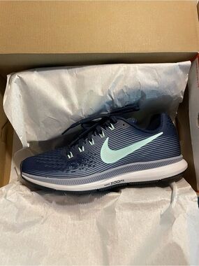 Nike Women’s Air Zoom Pegasus 34 with Mint Green Swoosh.